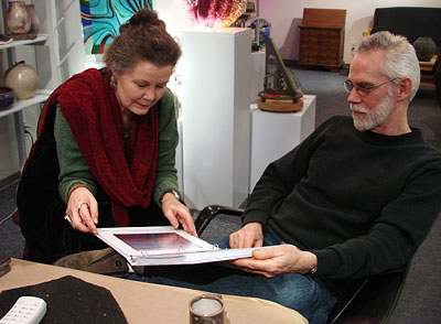 Gallery Manager Jean Meisner reviewing a portfolio with David during his Feb, 2007 demonstration.